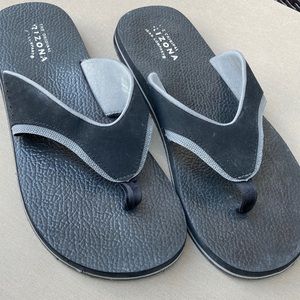 Men’s size 13 flip-flop style, sandals. Black with Grey trim. Gentle wear.